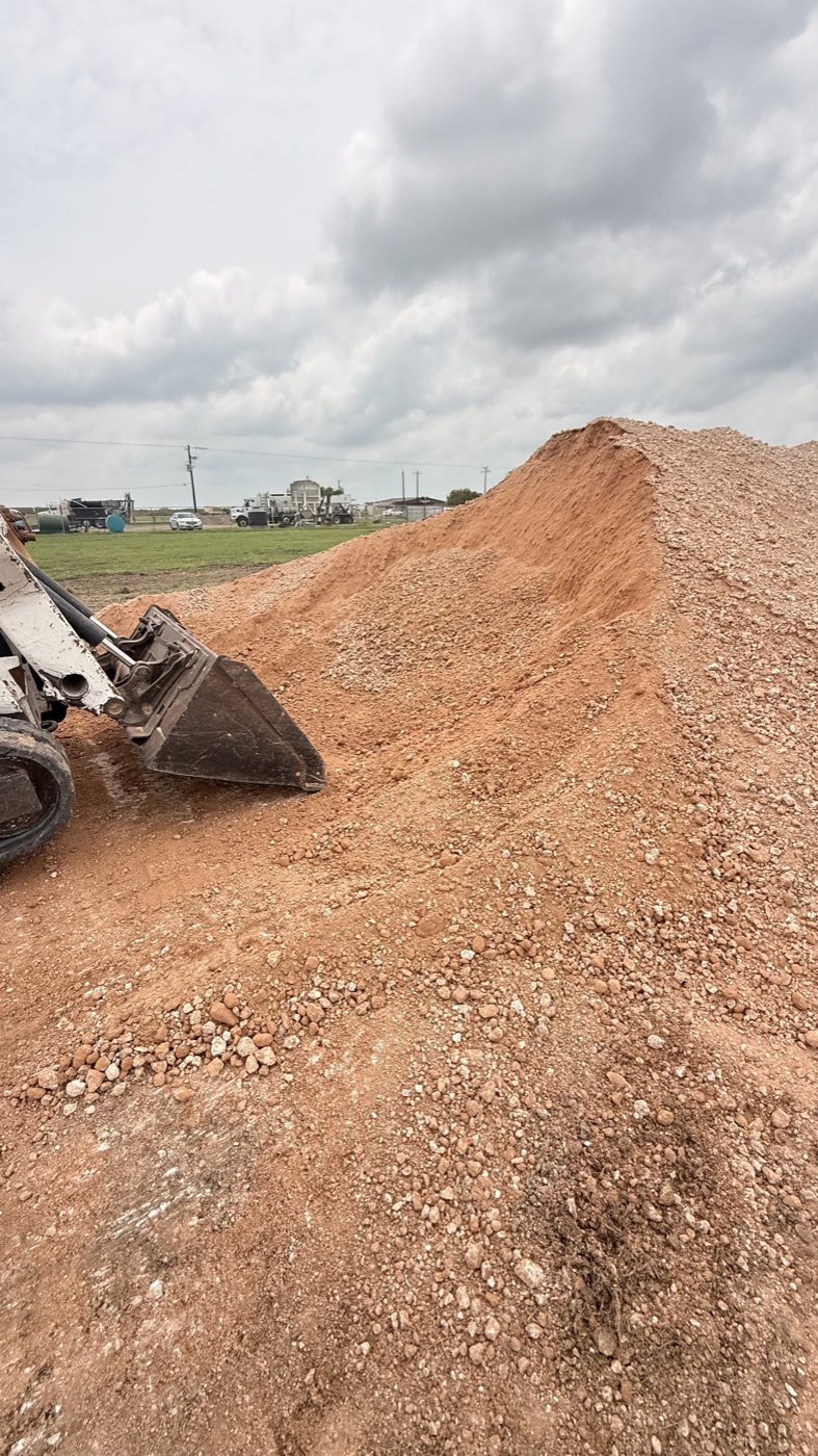 Bobcat moving aggregate at AMR yard